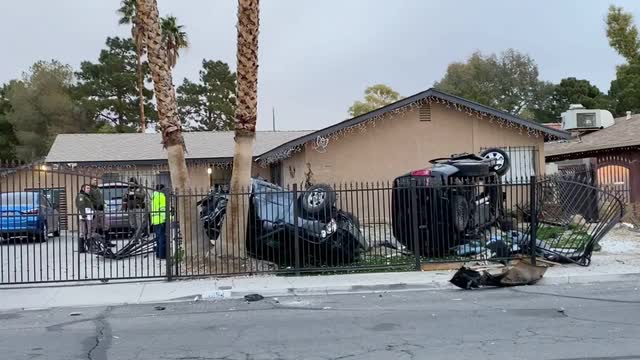 Las Vegas Review Journal News | Crash leaves 2 vehicles overturned in Las Vegas front yard