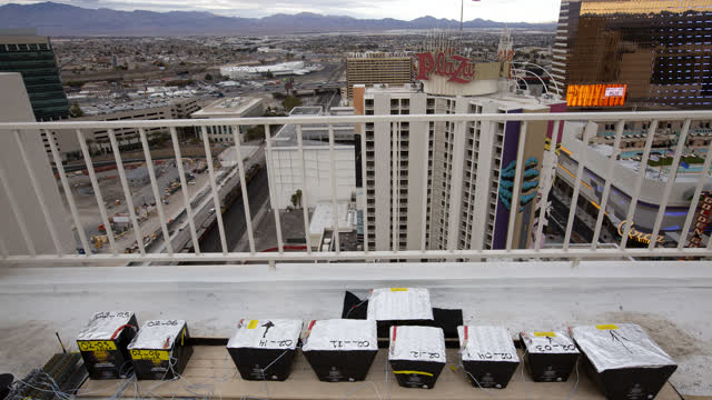 Las Vegas Review Journal News | Pyrotechnicians ready the NYE fireworks show atop the Plaza