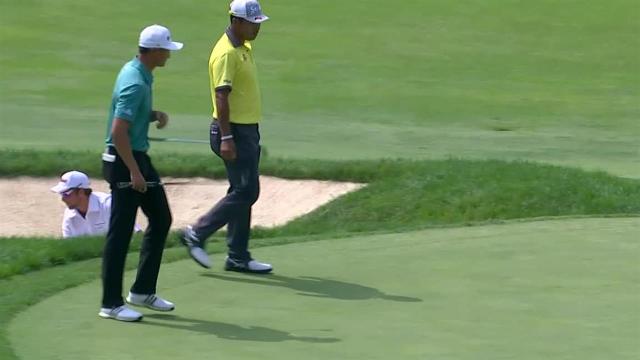 Hideki Matsuyama chips in from the deep rough for birdie at the Memorial